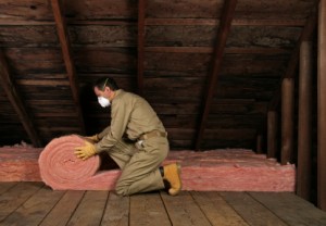 attic insulation over floorboards